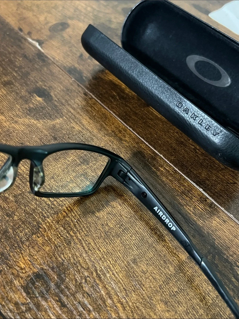 Oakley 143 0X8046-0155 satin Black Rectangular Sunglasses with Branded Case